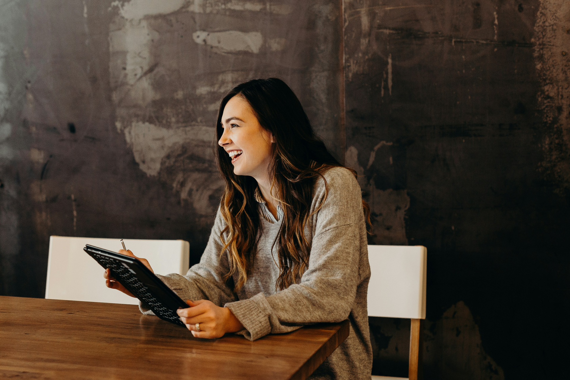 Business owner reviewing working capital on a tablet